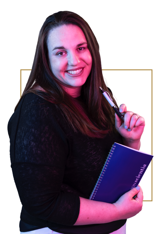 Kathryn Jones, Senior Scientific Director at PRECISIONscientia, smiling while holding a pen and notebook
